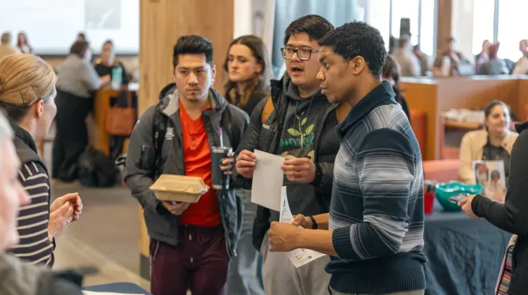 Students mingle at an organization fair in the Danielle N. Ripich Commons