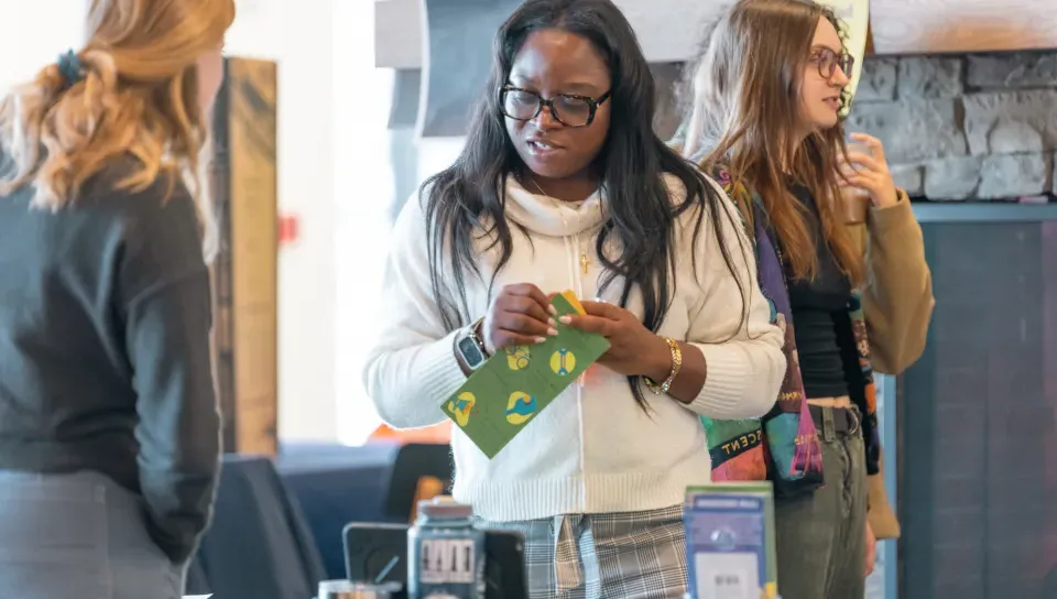 Students mingle at an organization fair in the Danielle N. Ripich Commons