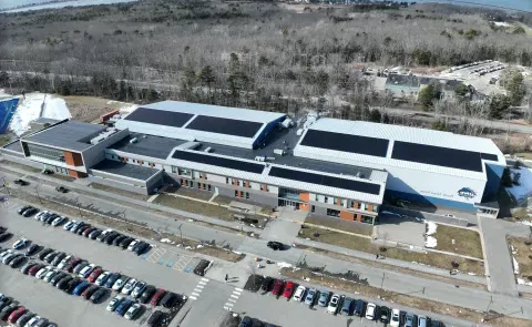 A solar array is shown on the roof of the Harold Alfond Forum in Biddeford