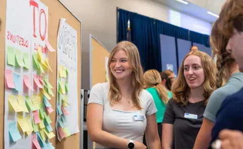 UNE health professions students complete an interactive case study in Innovation Hall 