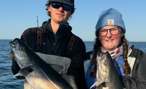 Amelia Burbidge and Evan Kamoen fish off the coast of Maine. 