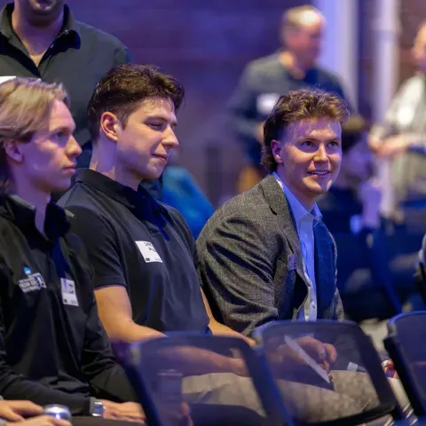 UNE students watch a panel discussion in Innovation Hall